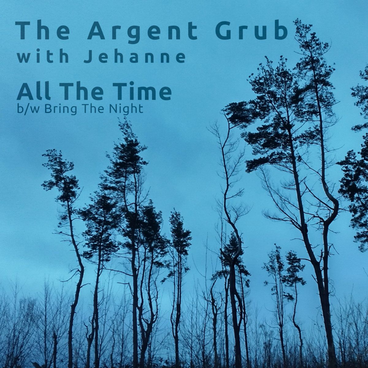 Bare trees against a sky. The whole image is a deep blue colour.